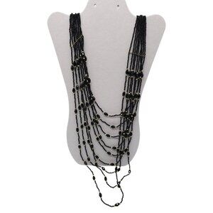 Multi Strand Black Seed Bead Necklace With Faceted Accents And Gold Tone Clasp